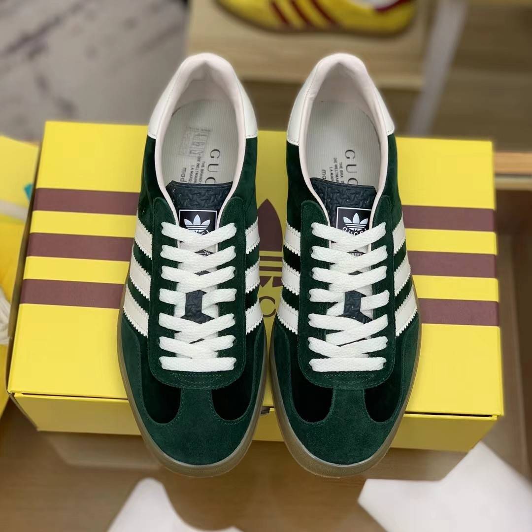 GU*I× Adidas sneakers