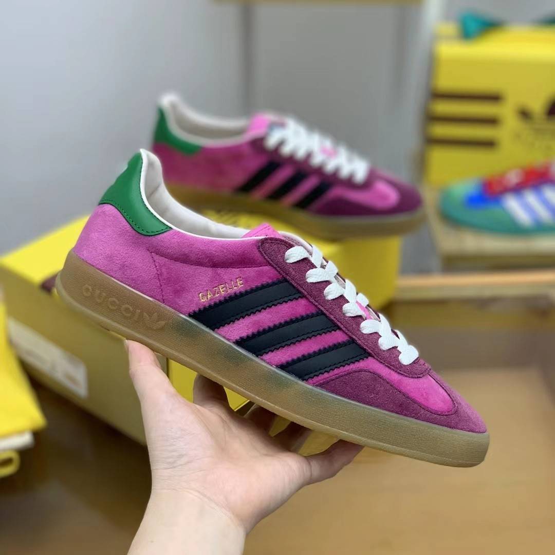 GU*I× Adidas sneakers
