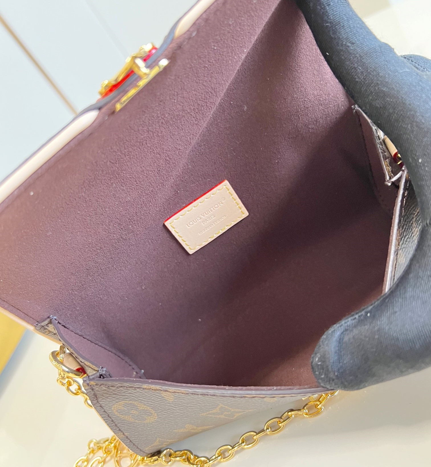 Louis Vuitton Pochette Camille Handbag